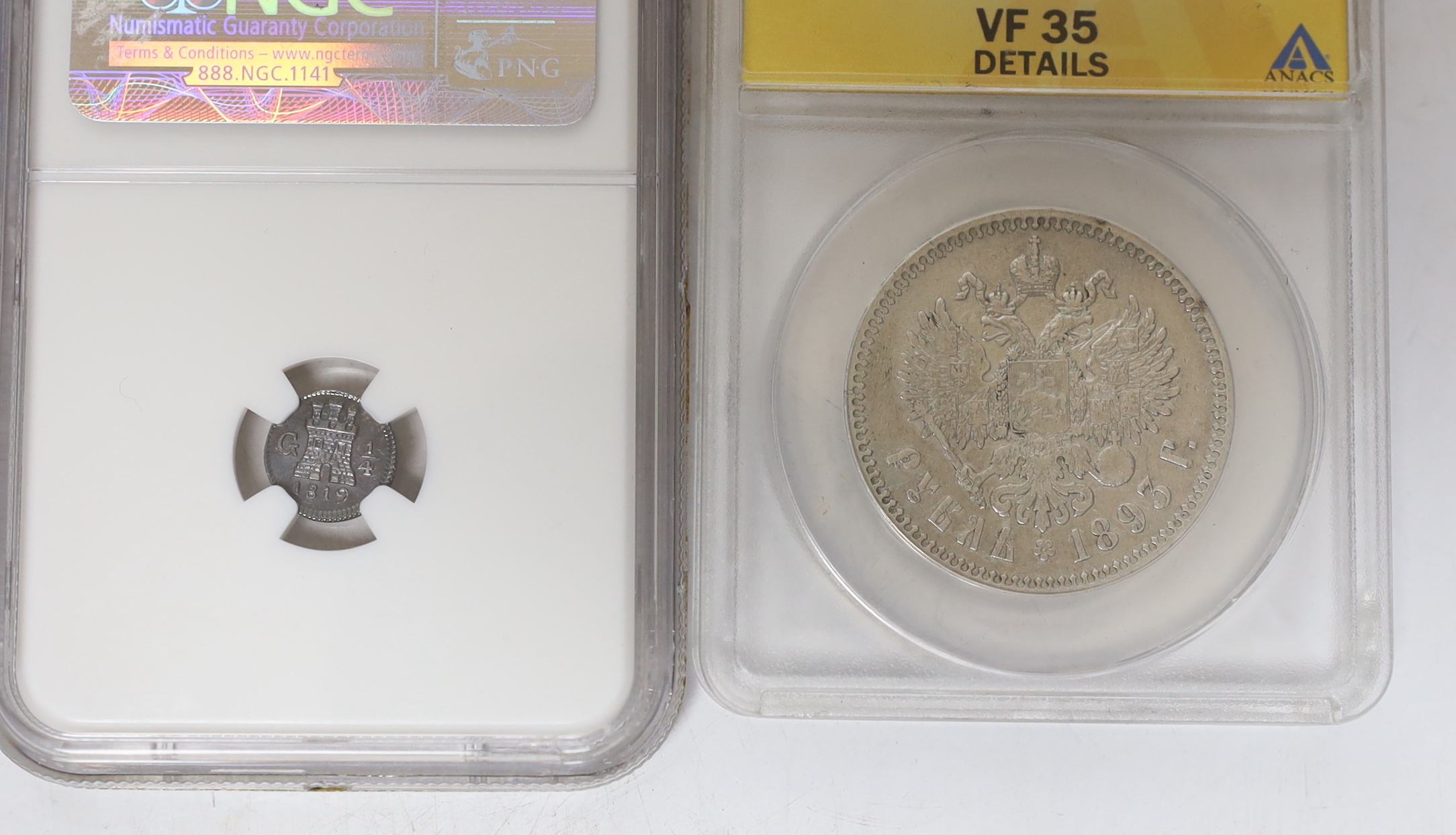 Russia One rouble 1893, ANACS graded VF 35, British India 2 Annas 1862 (C), NGC graded UNC, damage to obverse, Guatemala quarter real, 1819 G, NGC graded MS 65 (the highest graded example by NGC), Sweden 1/6 skilling 184